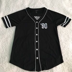 A never worn "made in the 90's" baseball shirt