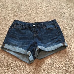 Rolled cuffed blue Jean shorts