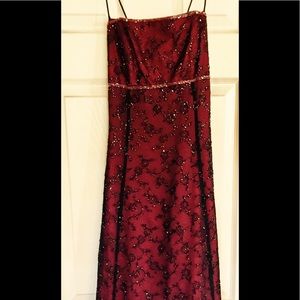 Beautiful black beaded lace over red prom dress