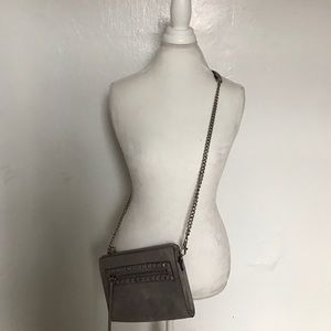 Studded cross body bag