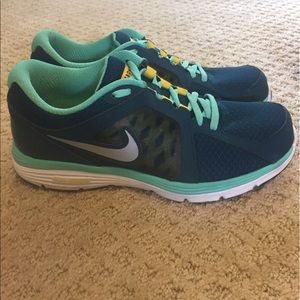 Teal Nike live strong sneakers