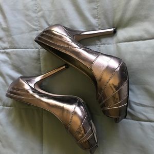Metallic silver heels about 3in heel