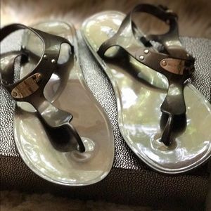 Michael Kors jelly sandals.