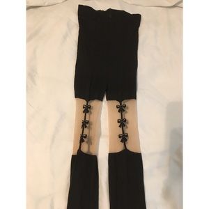 Black tights with row of bows