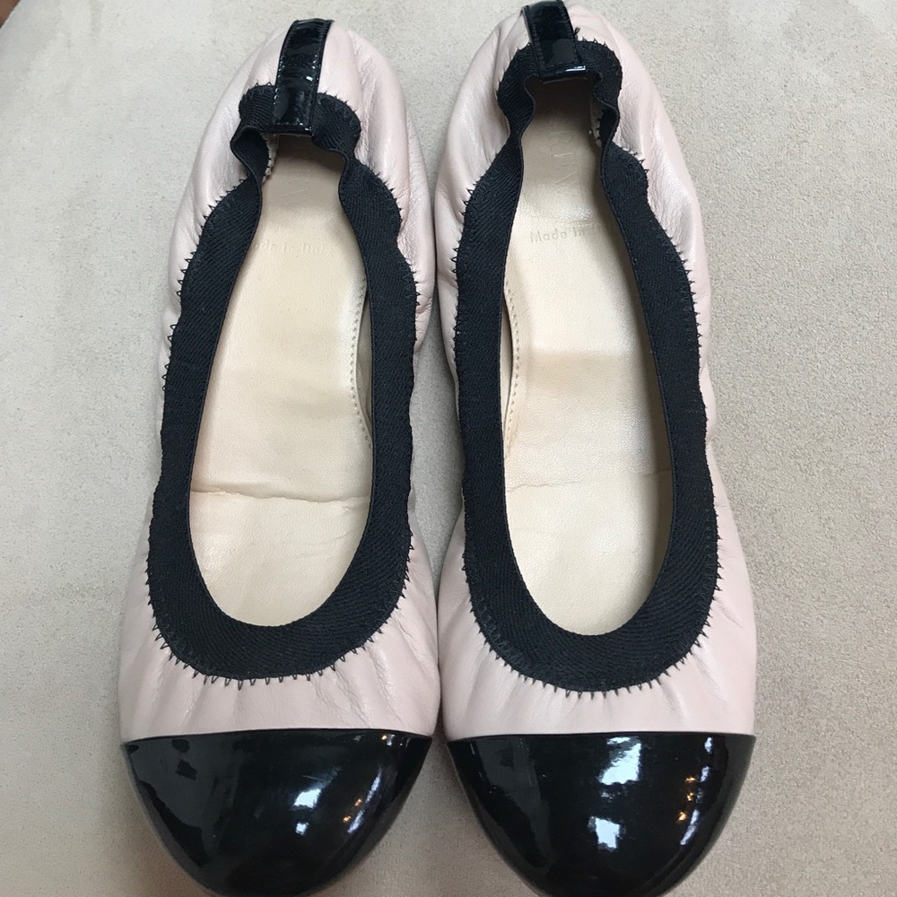 Nude and black flats