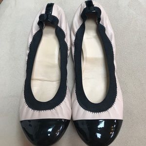 Nude and black flats