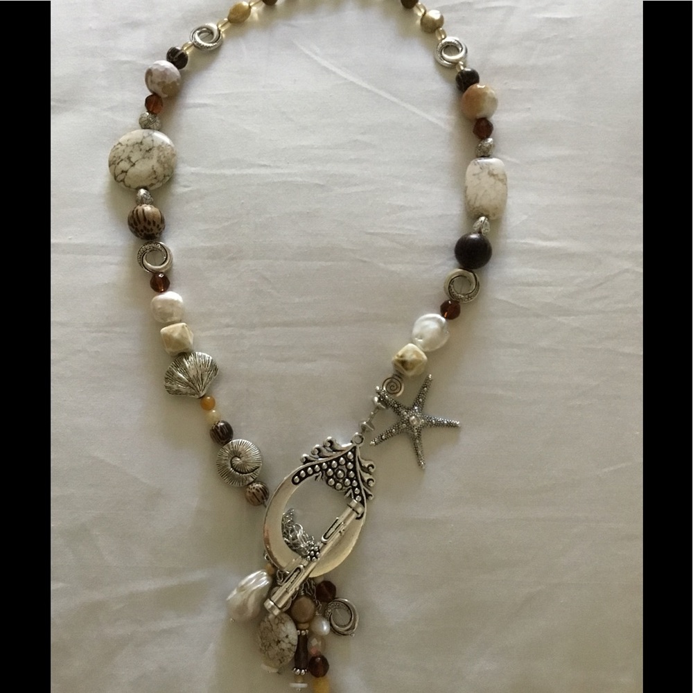 Fabulous longer necklace with front toggle closure