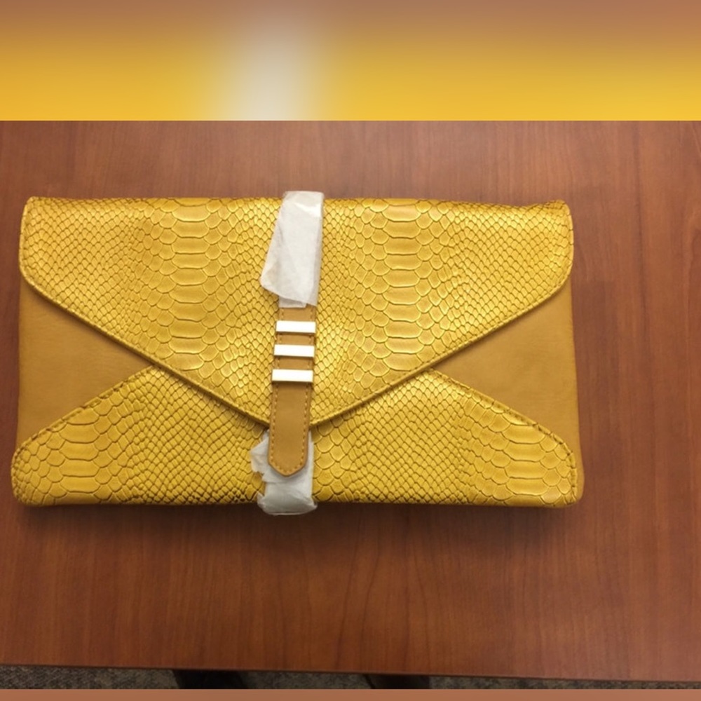 Yellow snakeskin clutch