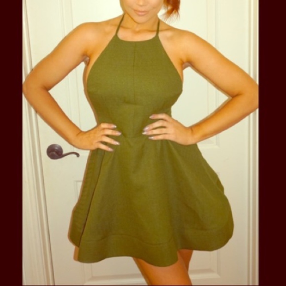 SOLD ✔️ on Merc Green petunia flare dress. Flirty & Fun!