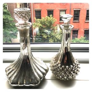 Two mirrored decanters