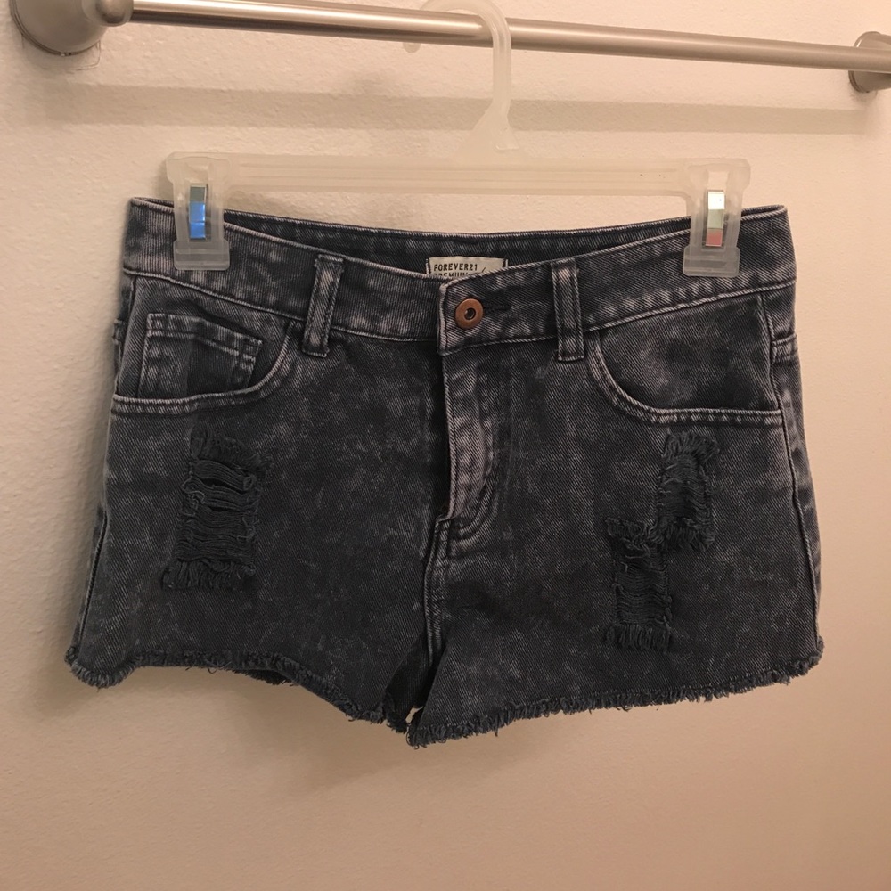 Blue jean shorts with rips