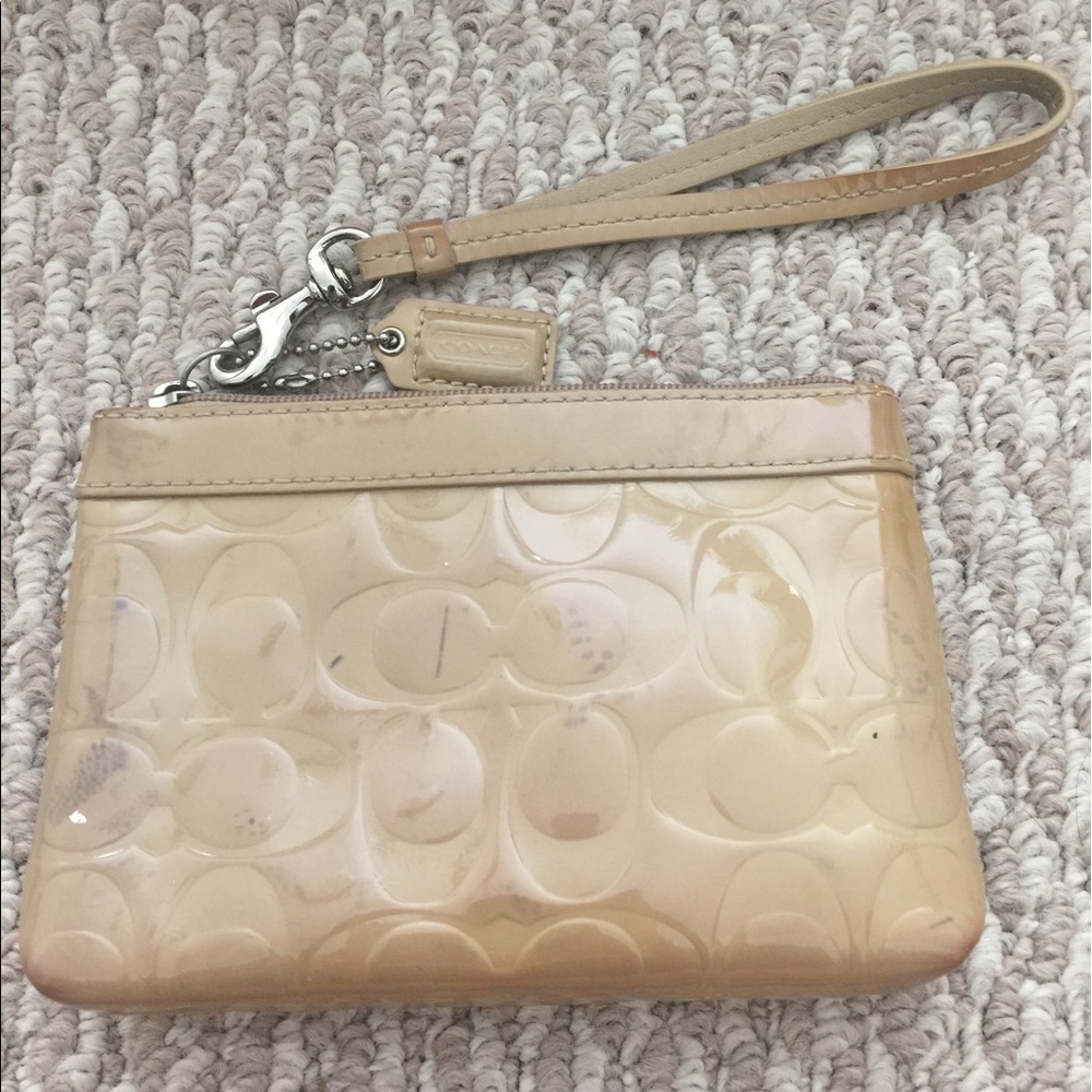 Nude coach wristlet