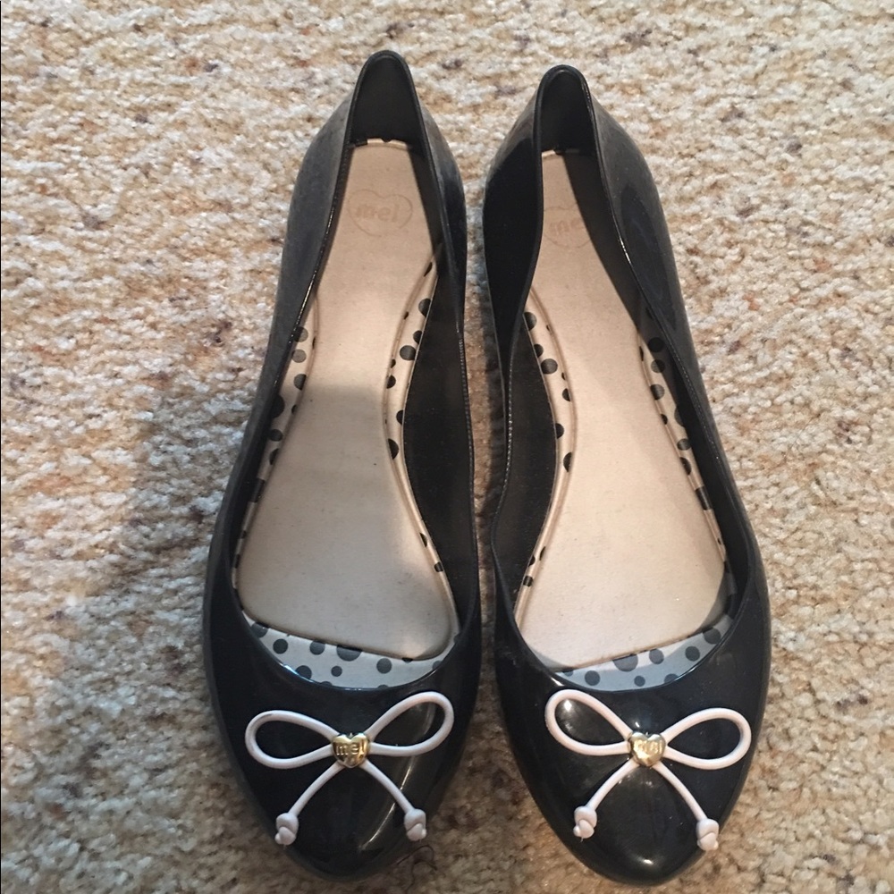 Mel by Melissa jelly flats size 9 black w tan bow