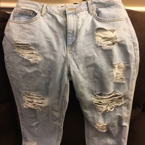 Distressed light washed boyfriend jeans