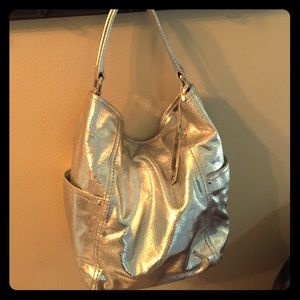 Cole Haan silver hobo bag.