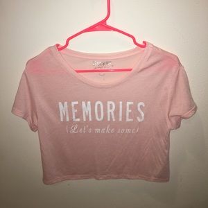 cropped, light pink tee shirt