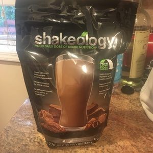 2.8 lbs chocolate shakeology. Never opened.