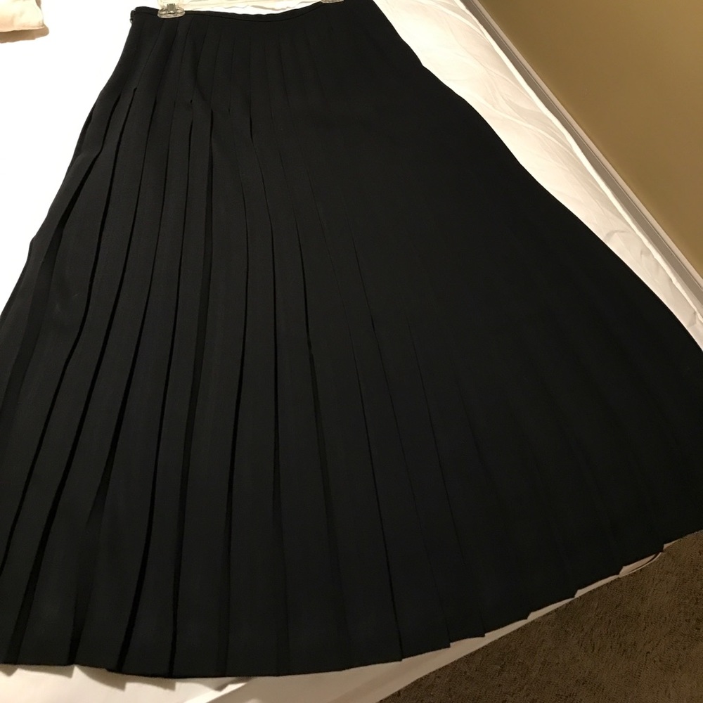 Long pleated black skirt