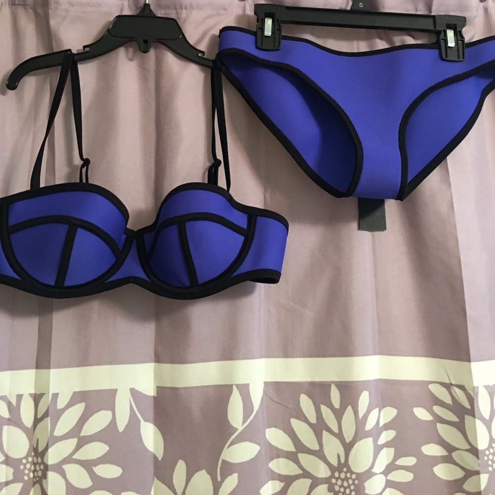 Never worn Triangle swimsuit