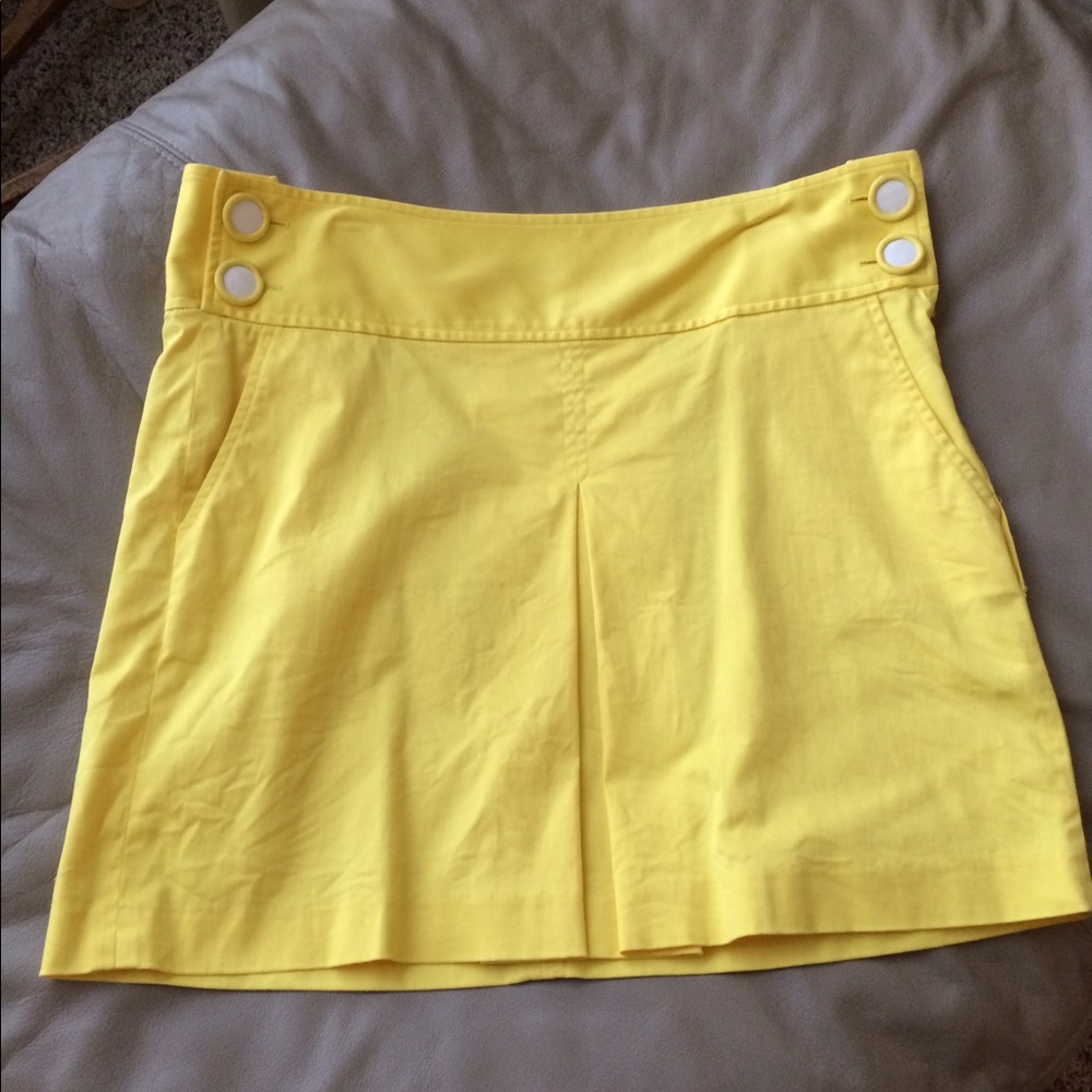 Yellow front pleated skirt