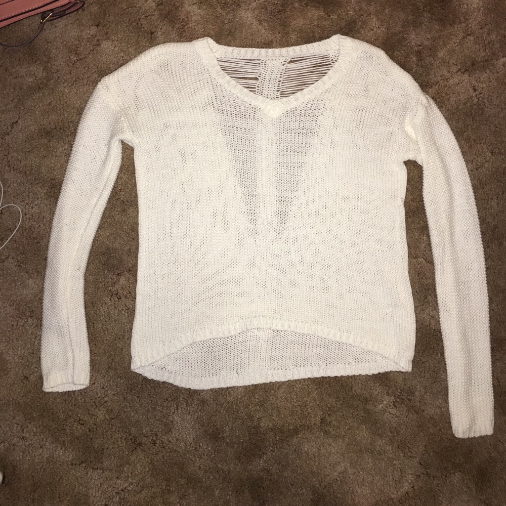 Sweater with cutouts on back