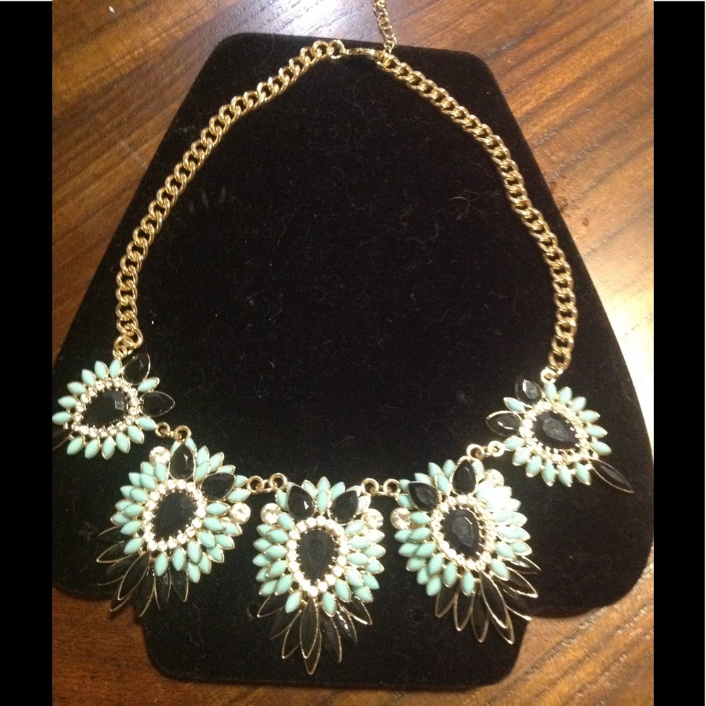Statement necklace with 5 black/teal pendants