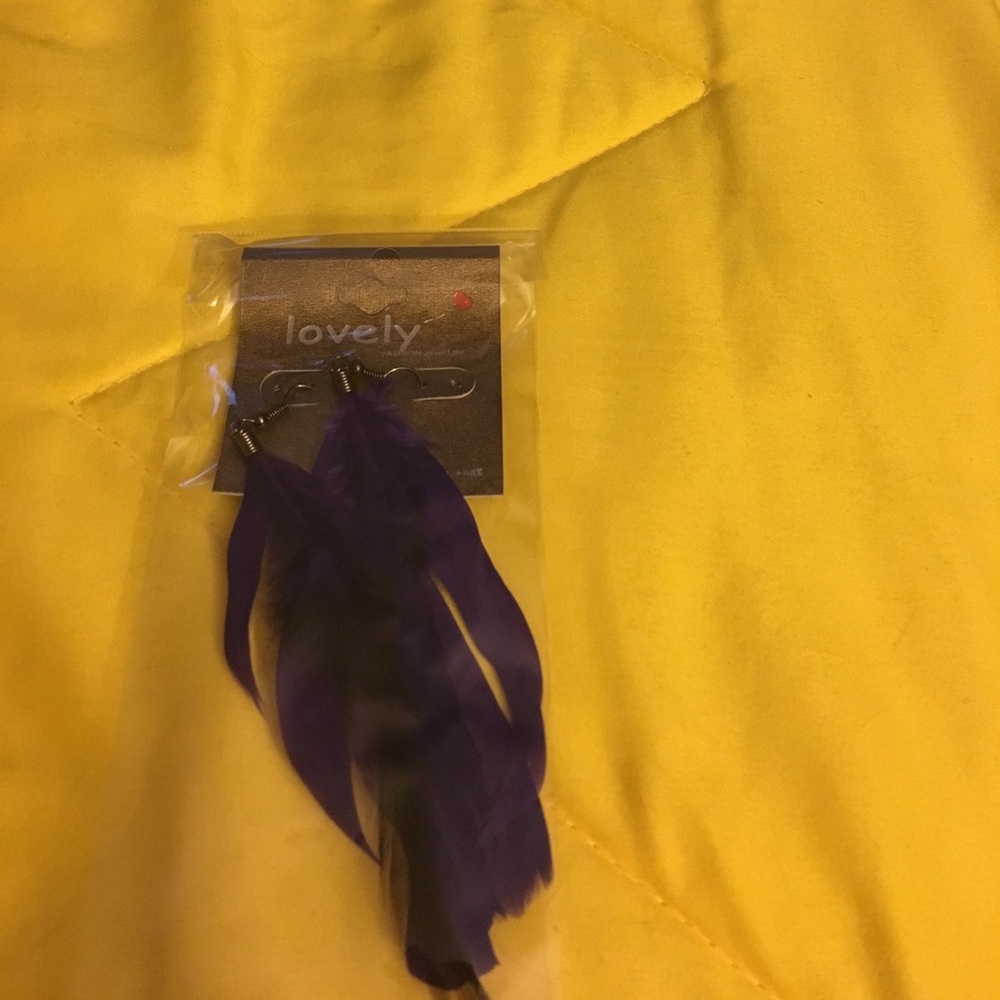 Beautiful purple feather earrings