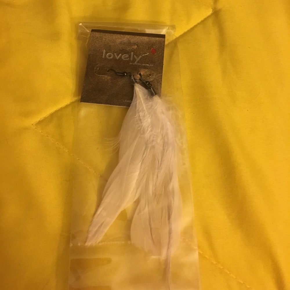 Beautiful white feather earrings