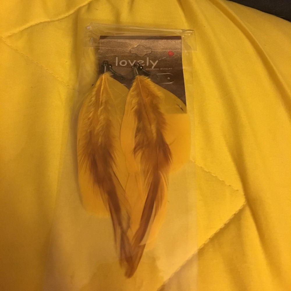 Beautiful yellow feather earrings