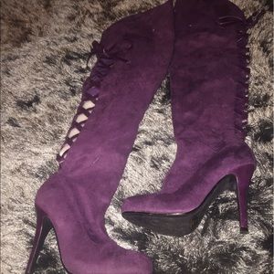 Tall high heeled lacy boots