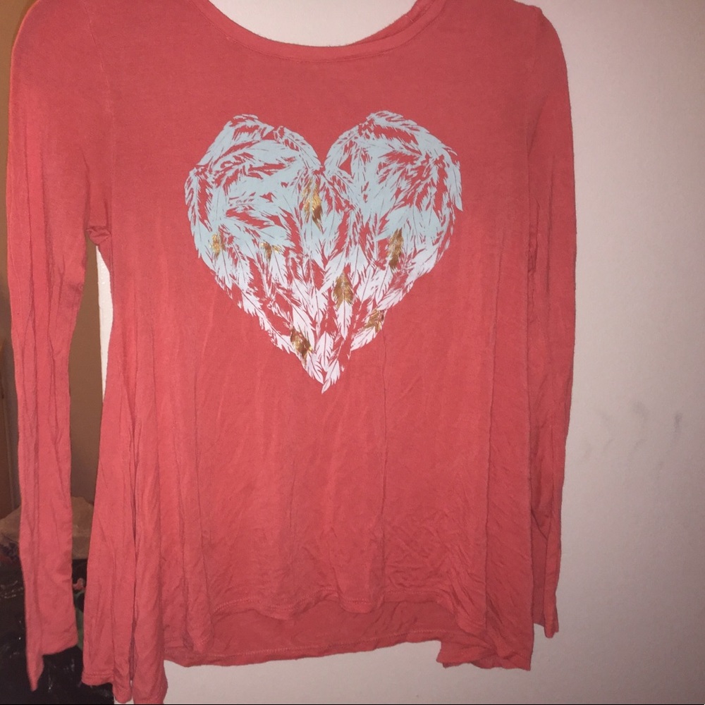 Long sleeve pink shirt with a heart