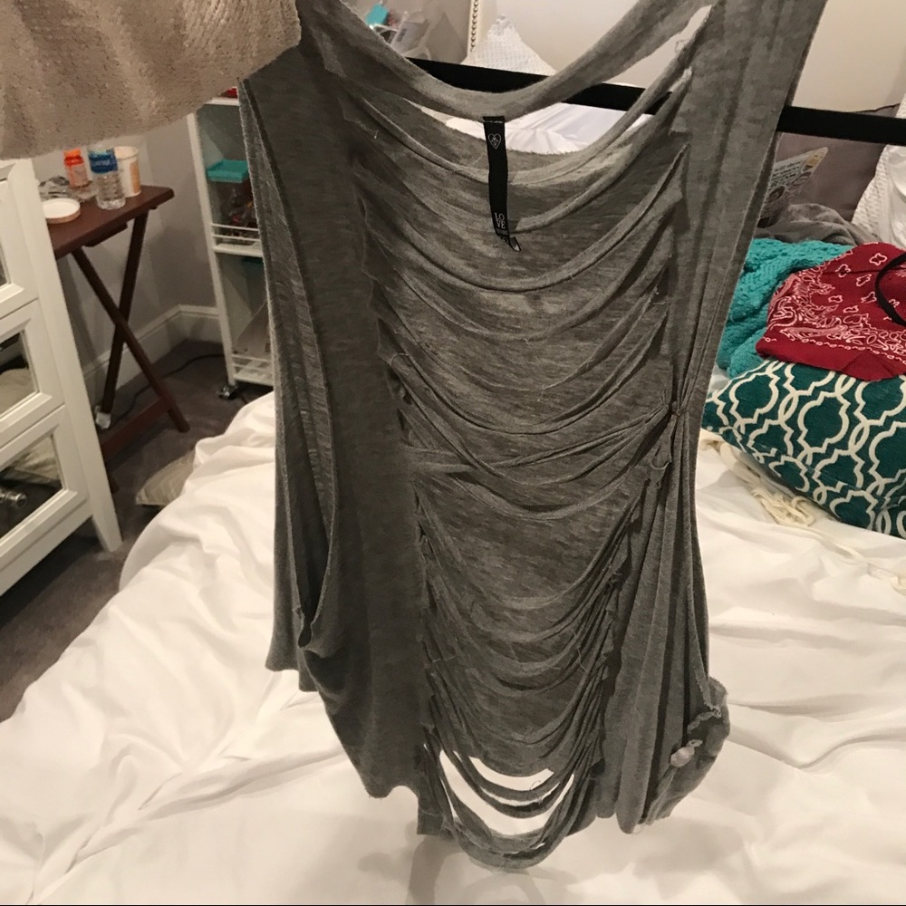 Gray tank with cutouts in back