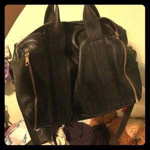 Black purse with zippers