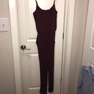 American rag romper- long pants- size L