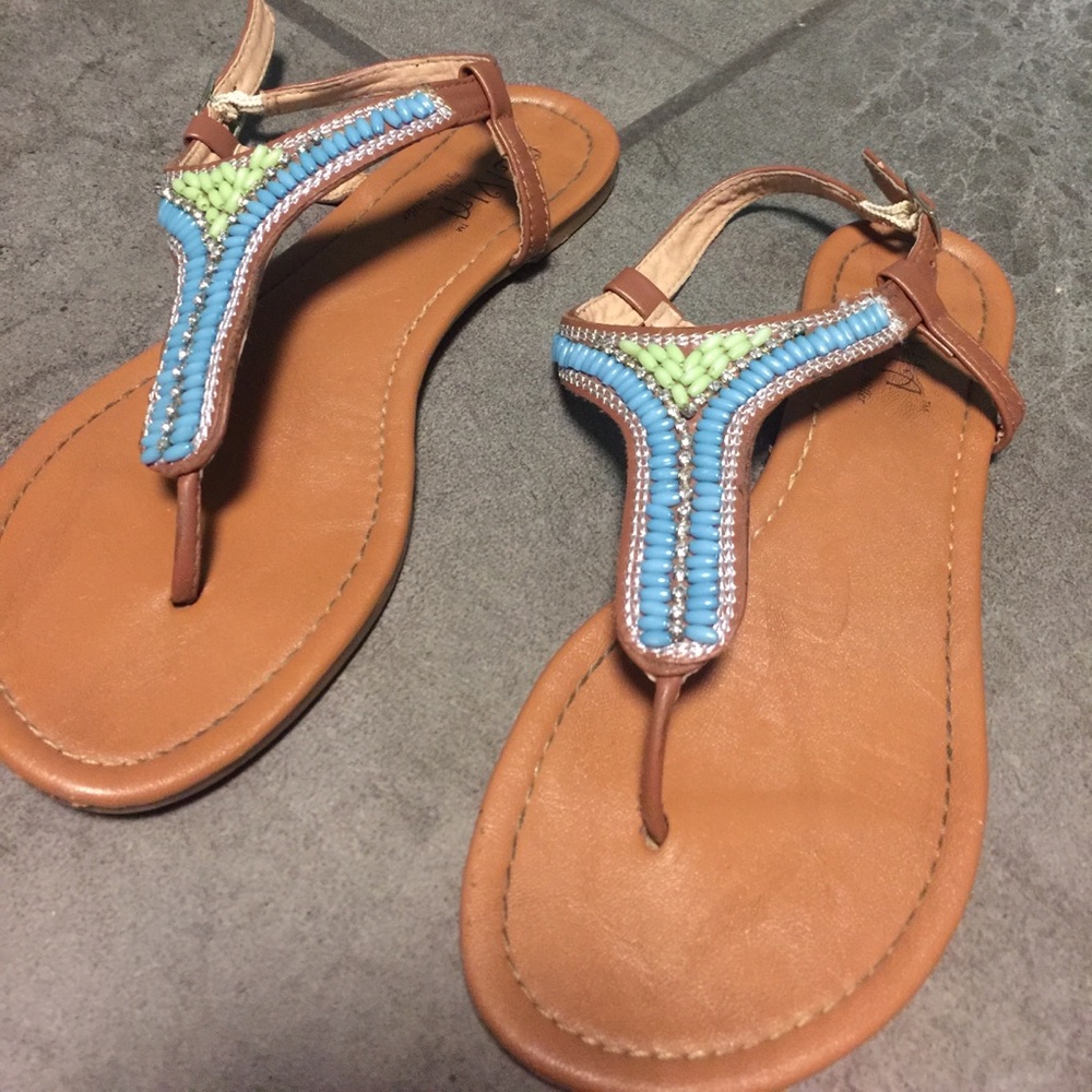 Beaded sandals.