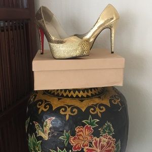 Beautiful gold Christian Louboutin