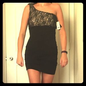One shoulder lace and sequin ruched bottom dress.