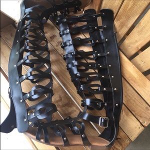Tall black gladiator sandals