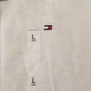 Off white size large Tommy Hilfiger polo shirt.