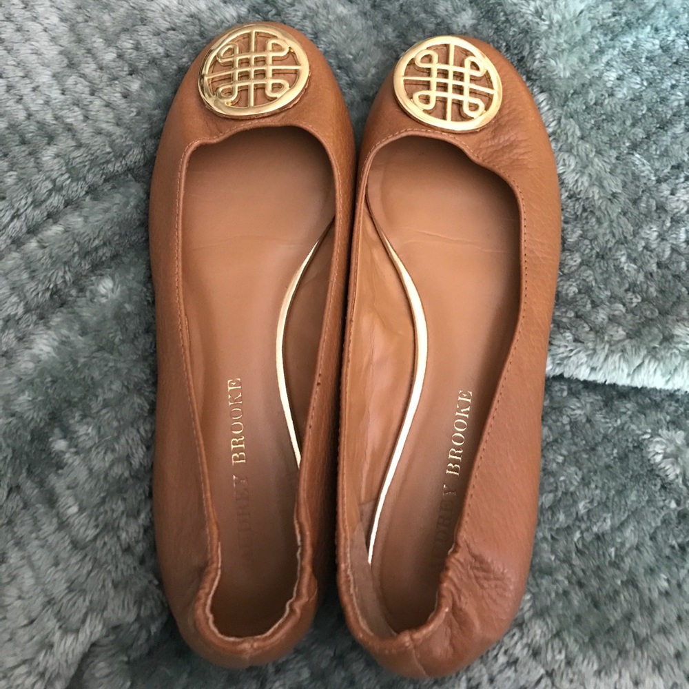 Audrey Brooke Tan flats with gold medallion