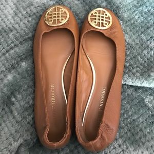 Audrey Brooke Tan flats with gold medallion