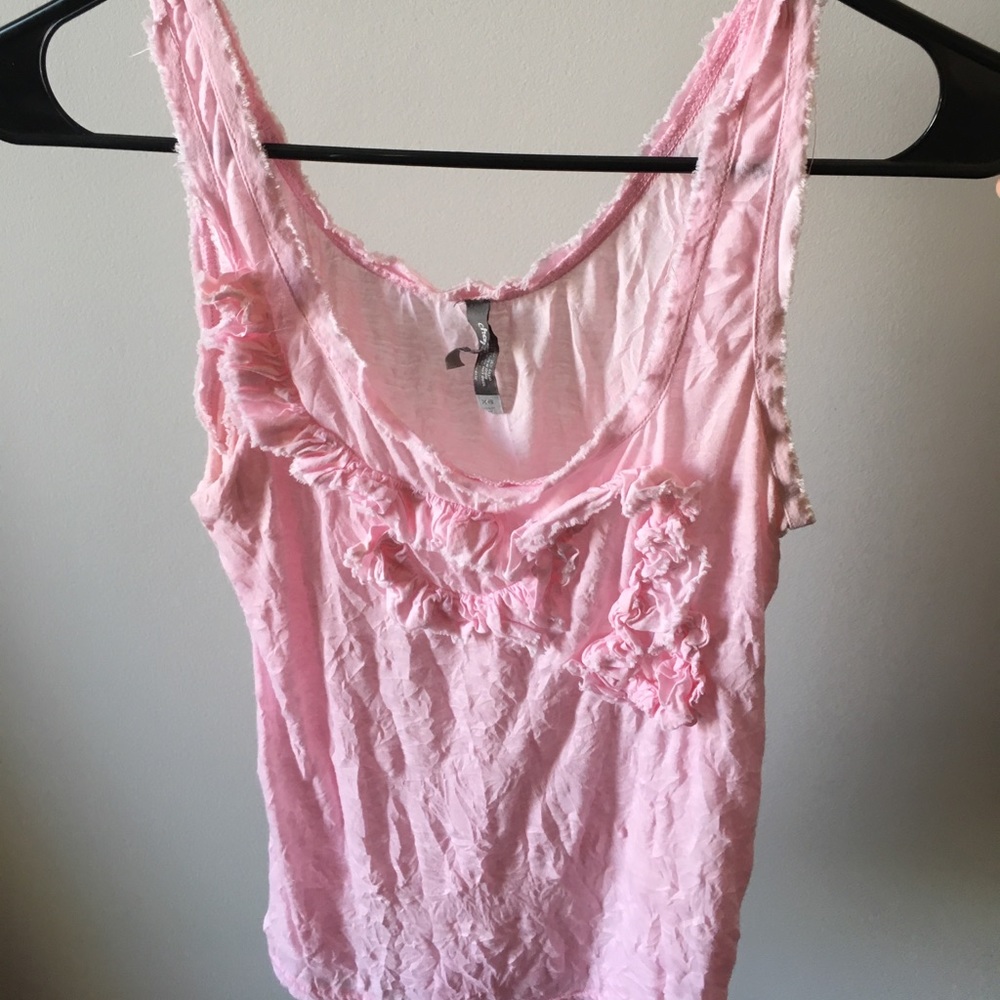 Light pink top with flowery design