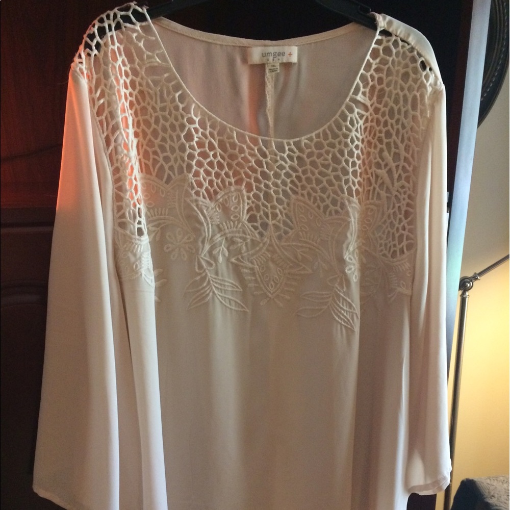 Boutique brand tunic top with embroidered detail