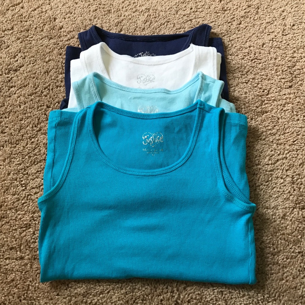 Bundle of four size 10 Justice Tanktops
