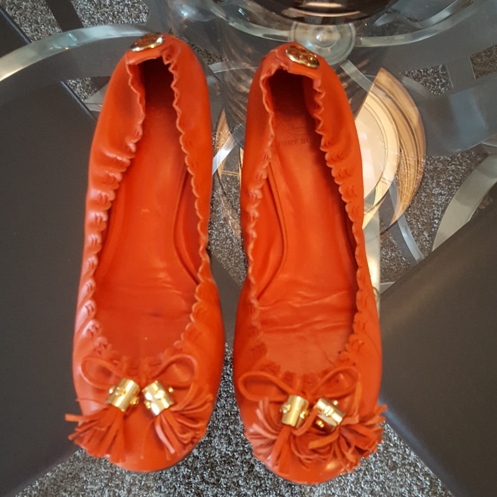Tory Burch orange tassel flats