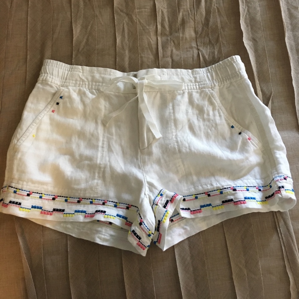 White shorts and cute little pattern at bottom