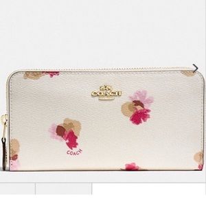 NWT Never used White Floral Wallet.