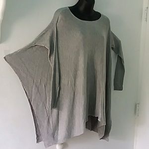 Poncho style sweater. Very light. New w/tags