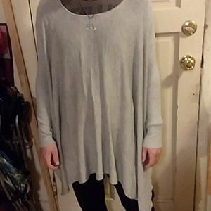 Poncho style sweater. Very light. New w/tags