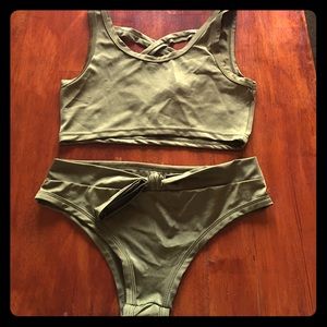 Two piece olive green swim suit, size small.